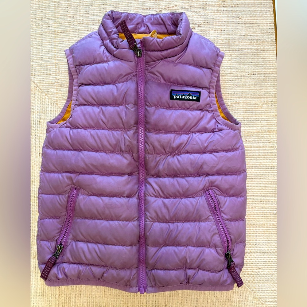 Girls purple vest in like new condition.